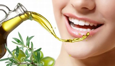 Thoa dầu oliu trực tiếp lên răng